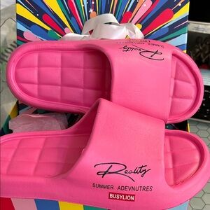 Reality Pink Slide Sandals —